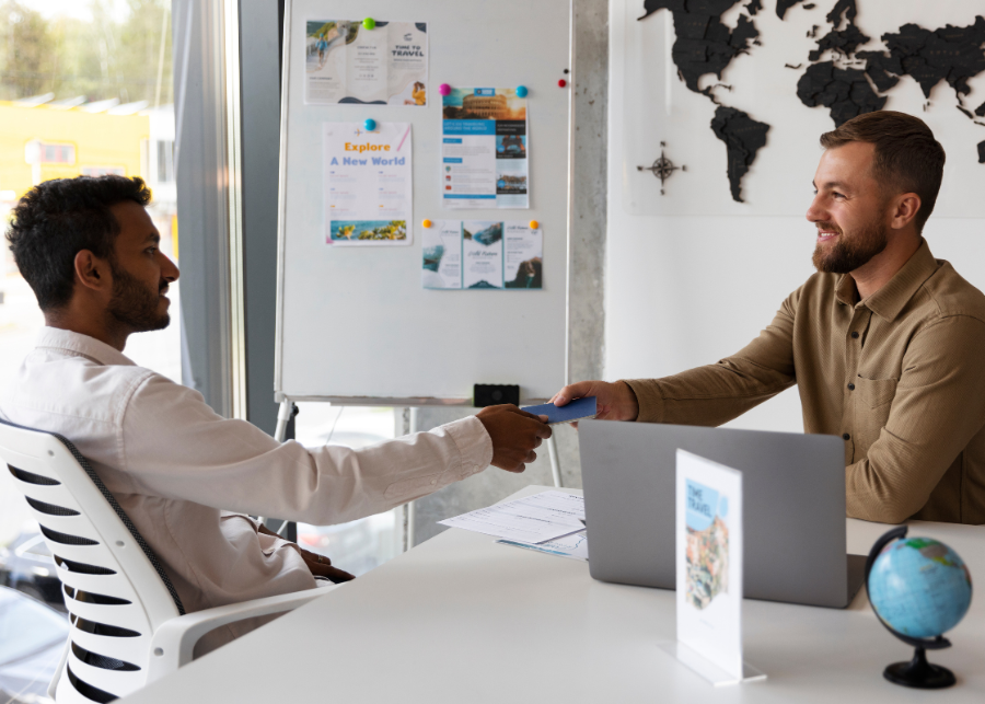 Professional visa service consultant assisting a traveler with visa application documents